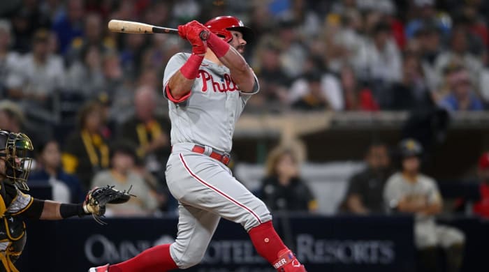 Jun 23, 2022; San Diego, California, USA; Philadelphia Phillies left fielder Kyle Schwarber (12) hits a two-run home run during the sixth inning against the San Diego Padres at Petco Park.